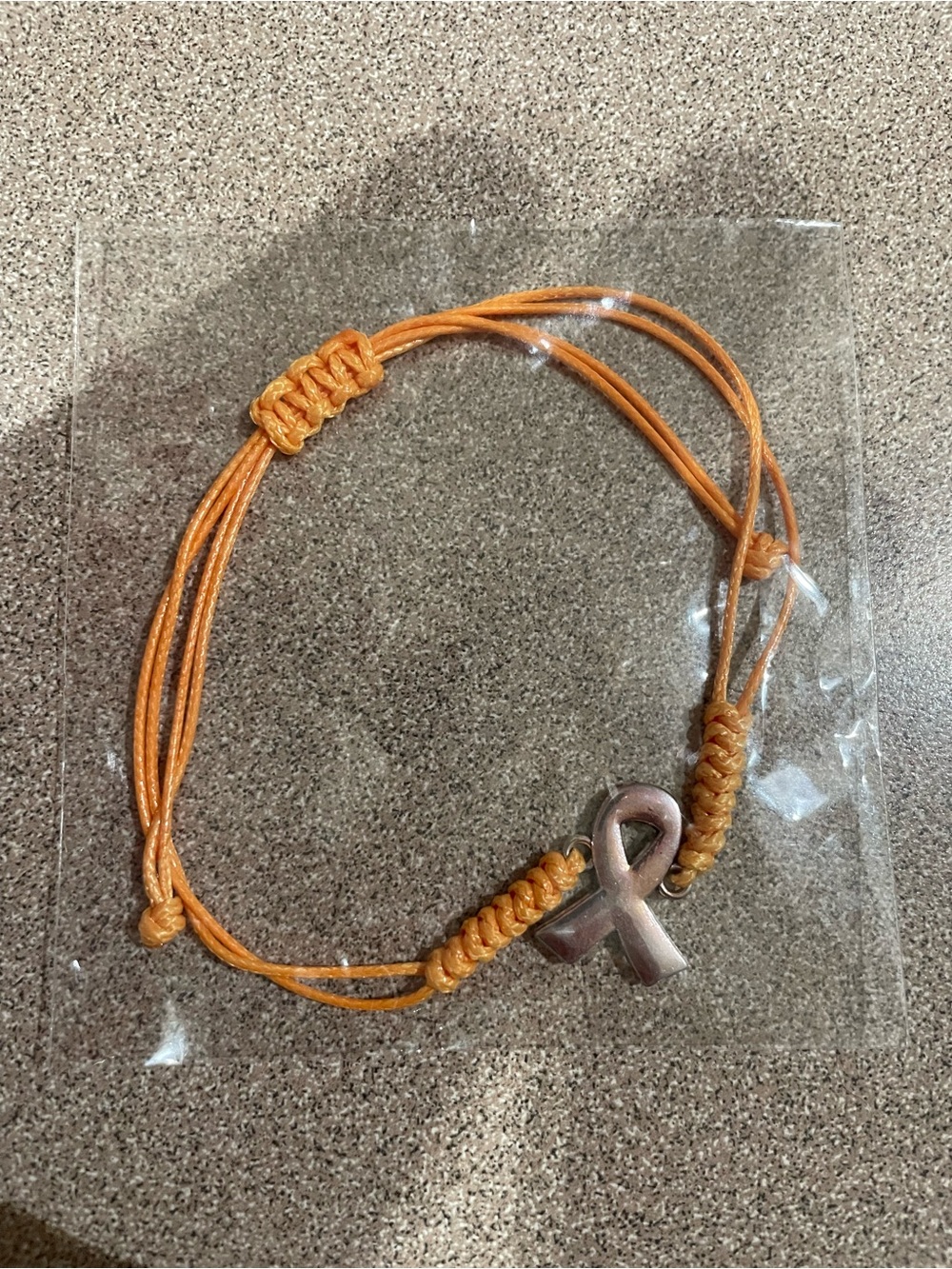53 Adjustable Orange Ribbon Charm Bracelet - Unbranded